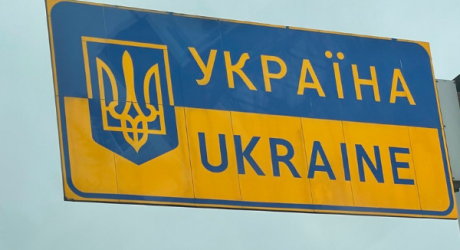 Ukraine border sign in Ukrainian and English 